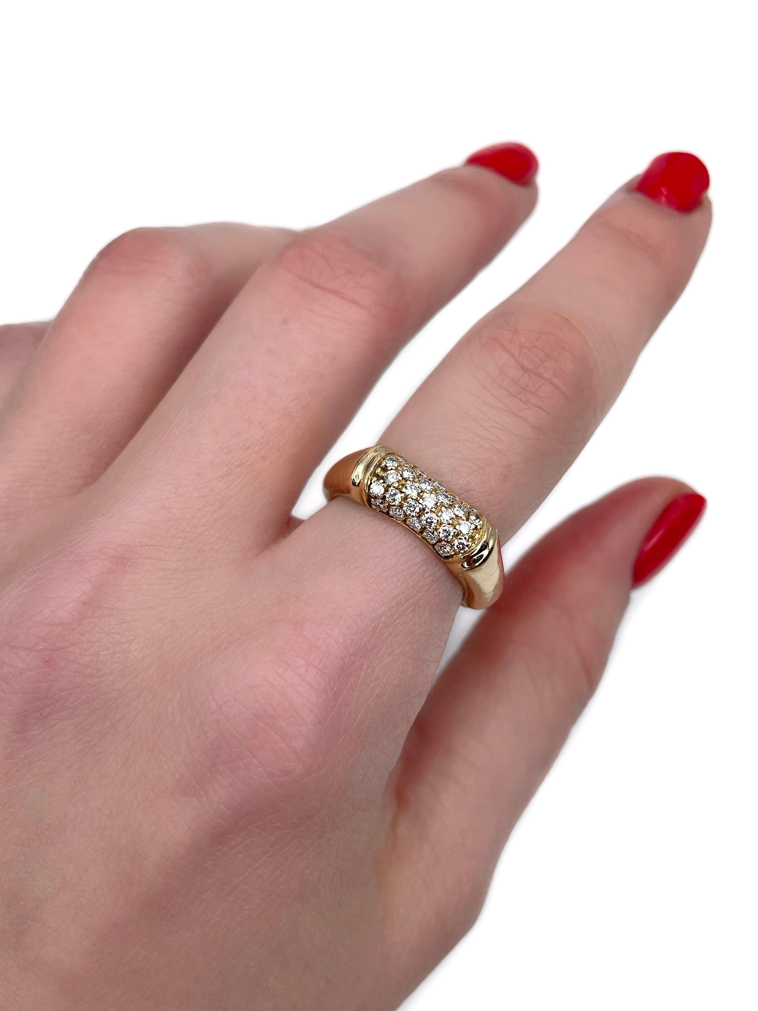 This is a bamboo design band ring crafted in 18K yellow gold. Circa 2000. 

The piece features 27 brilliant cut diamonds: TW ~0.40ct, RW+/W, VVS-VS. 

Weight: 5.25g 
Size: 16 (US 5.5)

IMPORTANT: please ask about the possibility to resize before