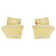 Modern 18 Karat Yellow Gold and .27 Carat Pave Diamond Knot Earrings
