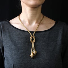 Modern 18 Karat Yellow Gold Diamonds Rubies Ram Knotted Necklace