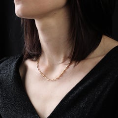 Collier moderne en or jaune 18 carats à boucles alternées