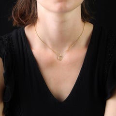 Colgante moderno "Amor" de oro amarillo de 18 quilates en forma de corazón