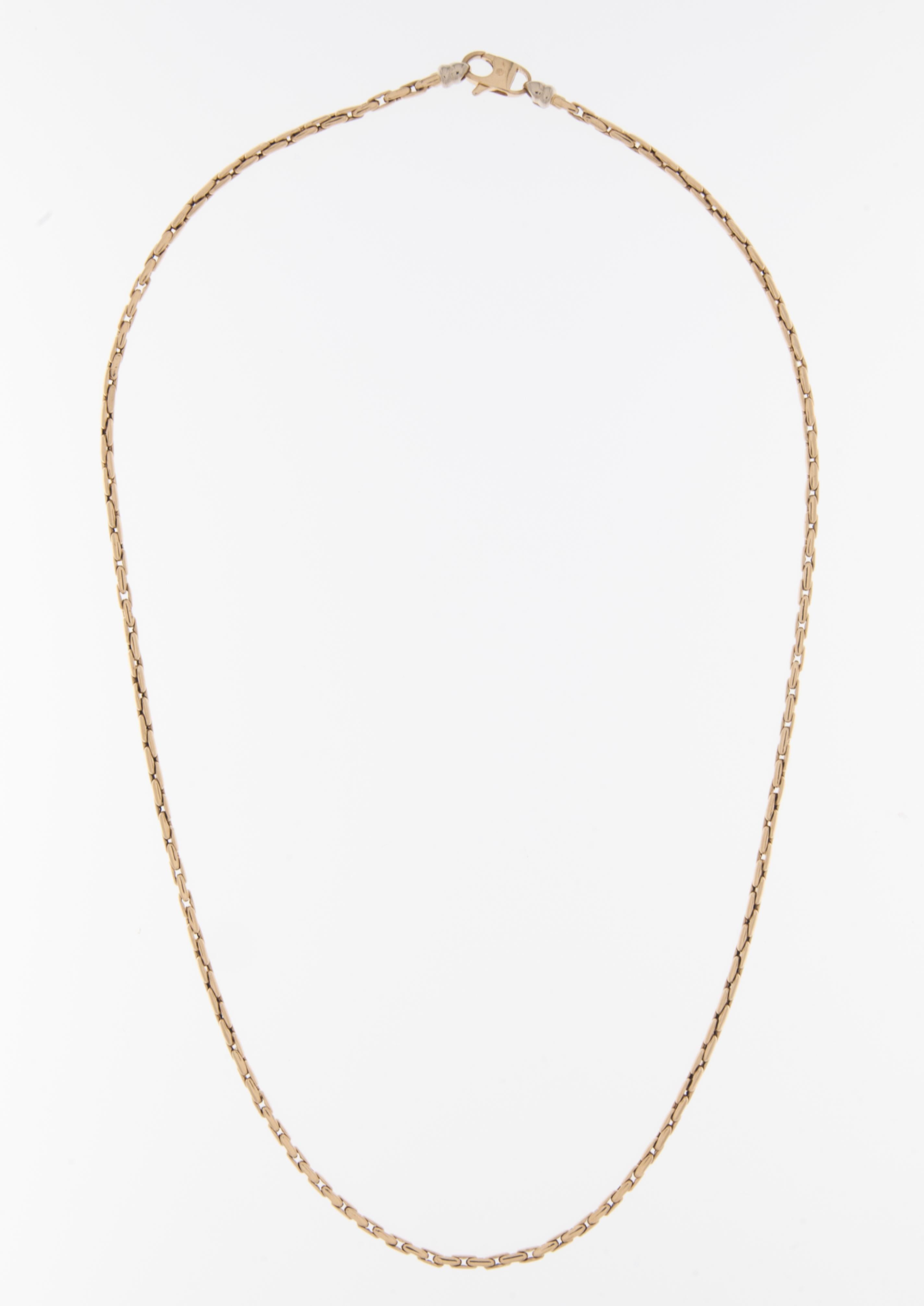 The Modern 18-karat Yellow Gold Italian Necklace is a contemporary and stylish piece of jewelry that epitomizes Italian craftsmanship and design. Crafted with precision and attention to detail, this necklace reflects the modern aesthetic while