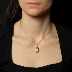 Modern 18 Karat Yellow Gold Oval Locket Pendant