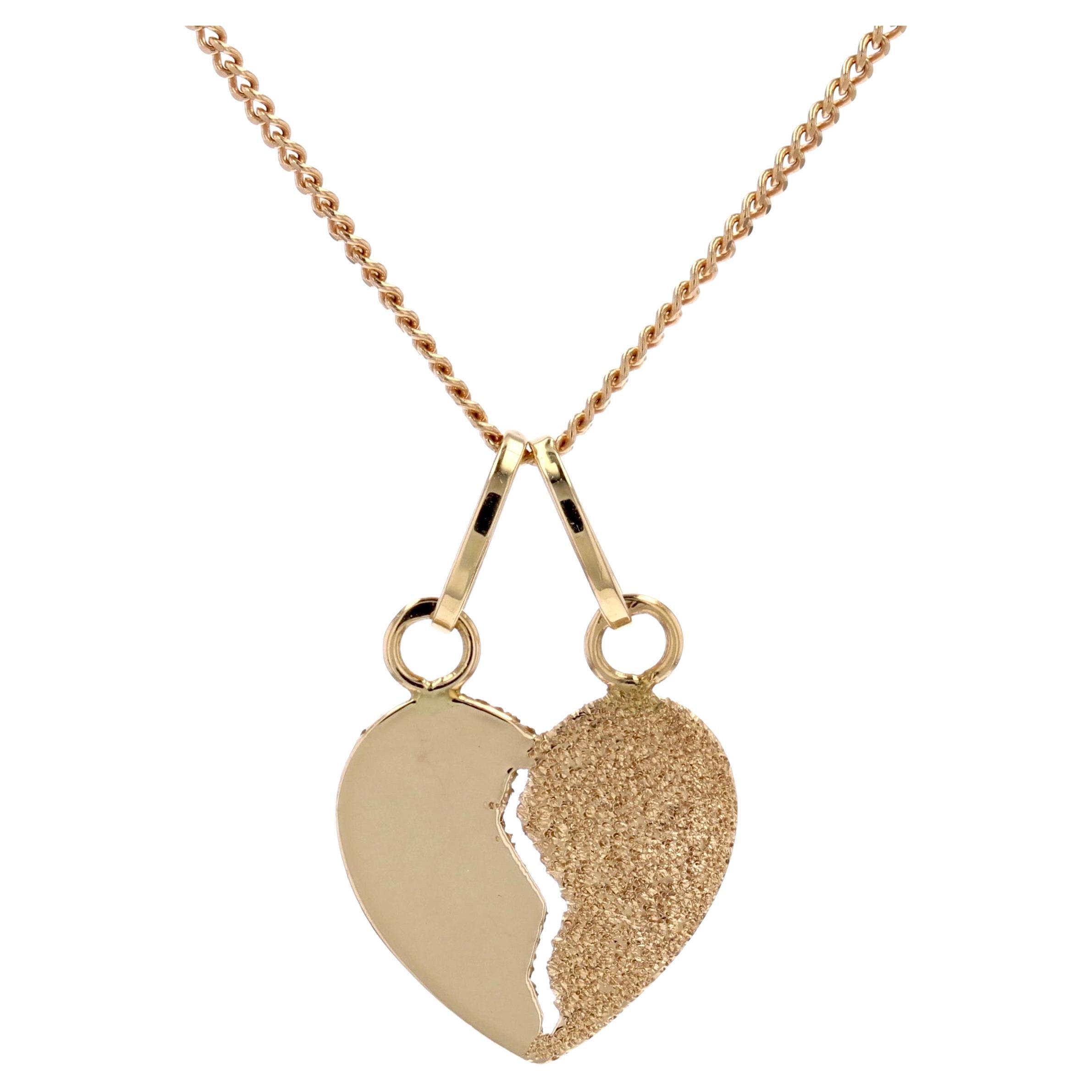 Modern 18 Karat Yellow Gold Secutable Heart Pendant and Chain
