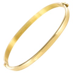 Modern 18 Karat Yellow Gold Thin Bangle Bracelet