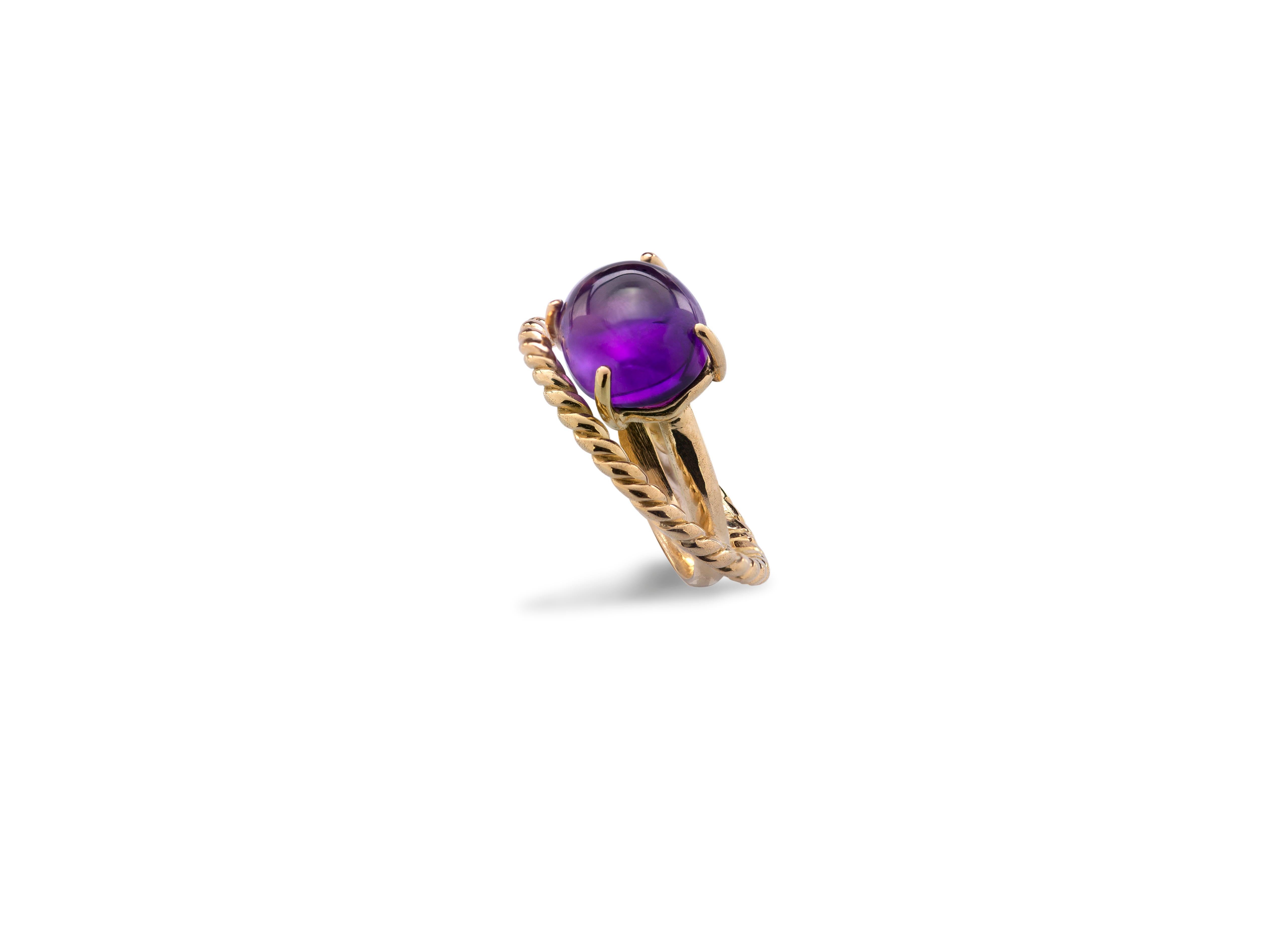 Modern 18 Karat Yellow Gold Twist Love Amethyst Handcrafted Design Ring.
This ring is handcrafted with two strips intertwined together in 18 karats yellow gold. 
A modern style design ring with an oval cabochon amethyst . 
Inspired by the union of