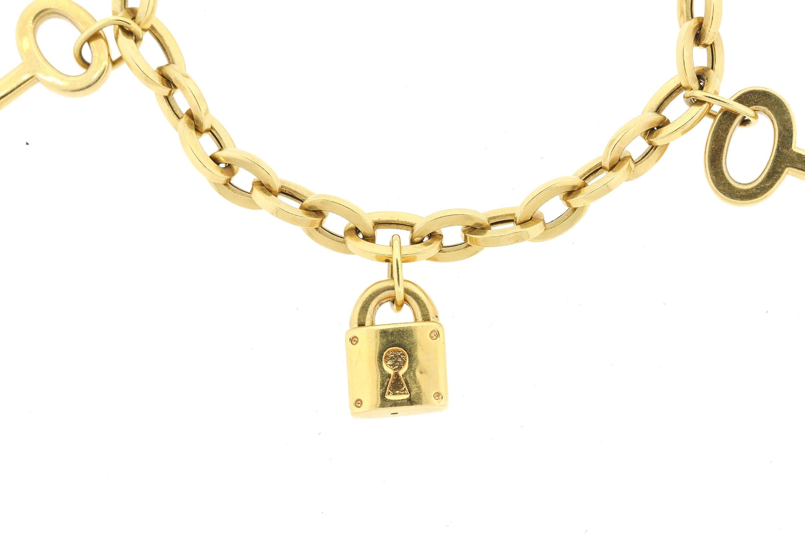 Modernes Padlock- und Schlüsselanhänger-Armband aus 18 Karat Gold für Damen oder Herren im Angebot