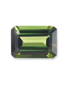 Modern 18k gold ring with an emerald-cut green Tourmaline and a pear-cut diamond
