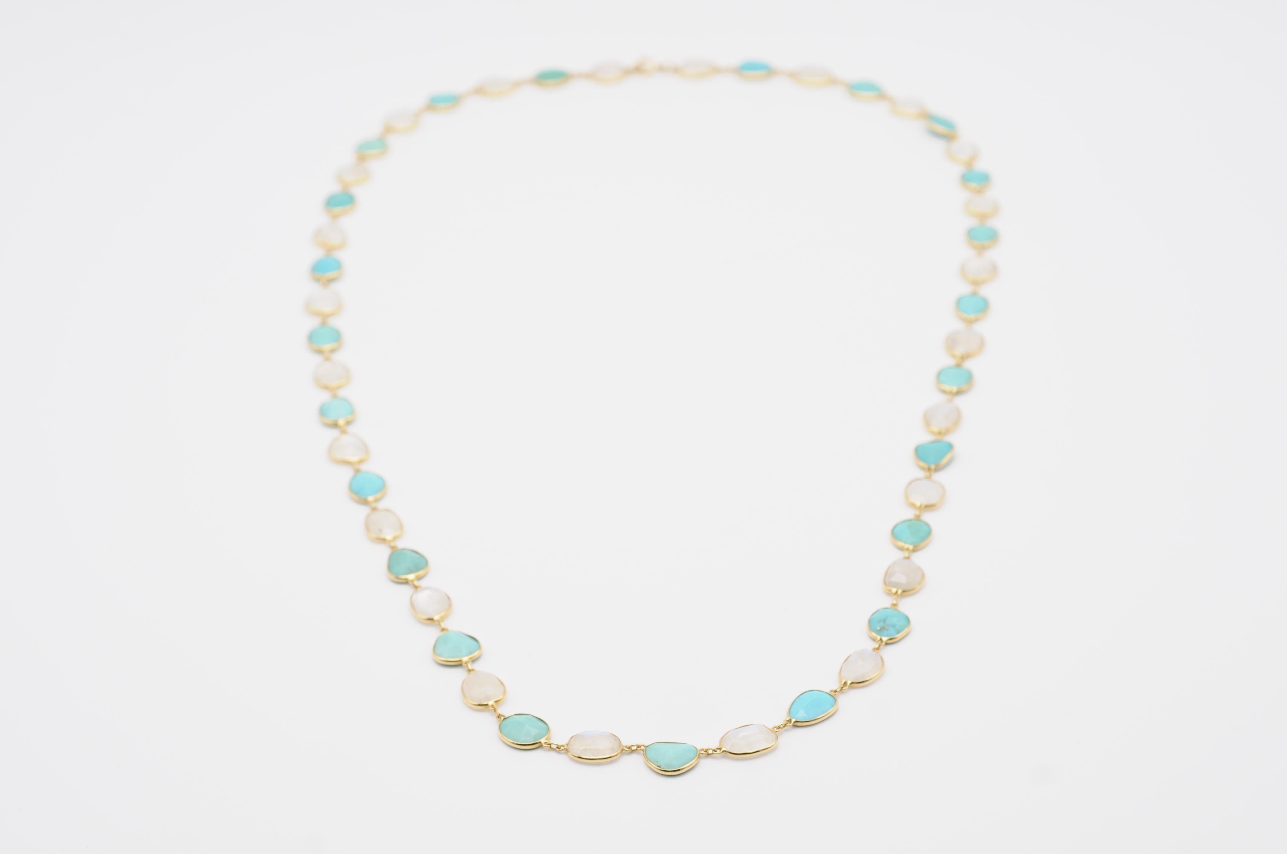 Indulge in the beauty of this modern 18k necklace with its captivating and unique design. The necklace is adorned with gorgeous and irregularly shaped rock crystals and turquoises, each of them beautifully framed in 18K yellow gold.

The exquisite