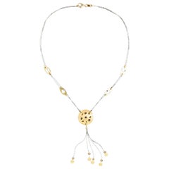 Collar moderno de oro de 18 quilates bicolor con estrellas y nubes Circa 2000s
