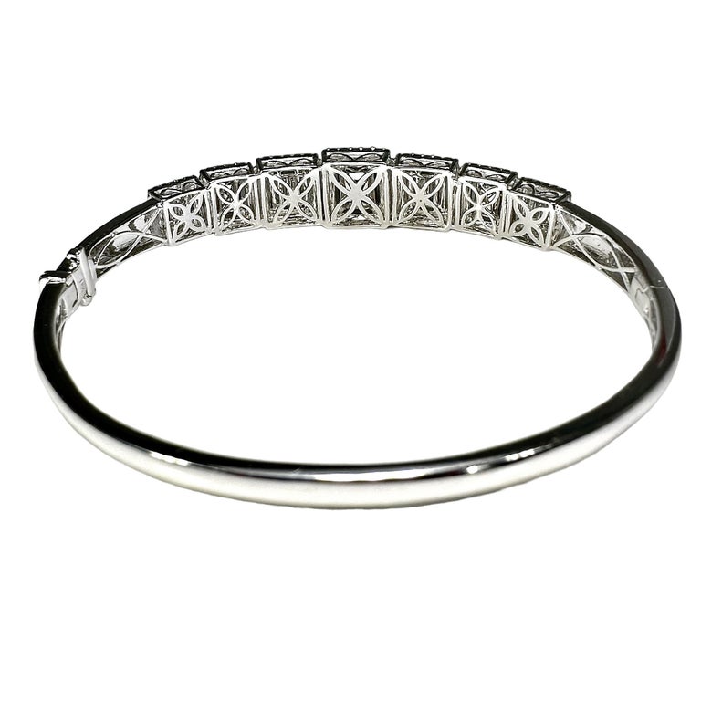 Modern 18K White Gold Emerald and Diamond Bangle Bracelet at 1stDibs