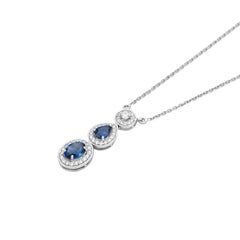 Modern 18k White Gold Graduated Sapphire and Diamond Halo Drop Pendant Necklace