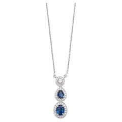 Modern 18k White Gold Graduated Sapphire and Diamond Halo Drop Pendant Necklace