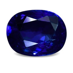 Modern 18k white gold necklace with a pear-cut blue Sapphire and a round diamond