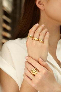 Modern 18 Karat Gold and .23 Carat Pink Sapphire Single Whirl Stacking Band Ring
