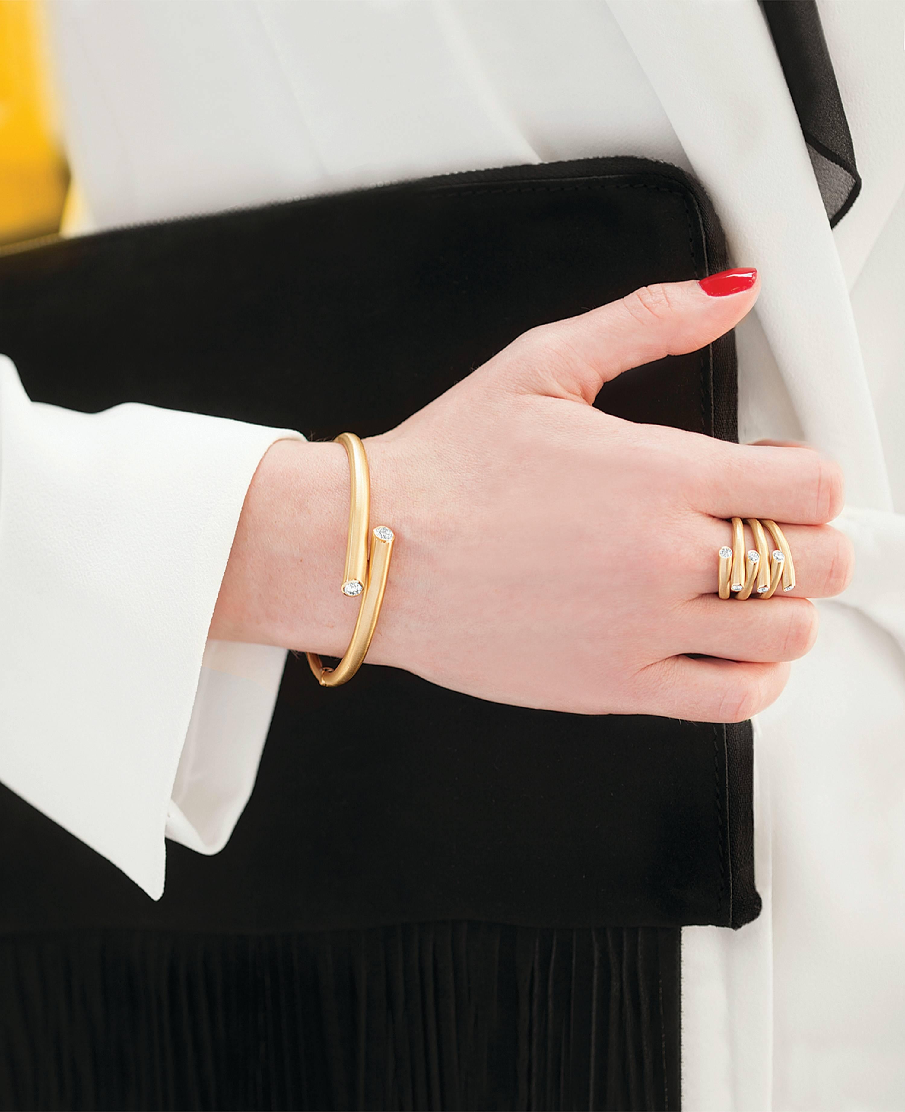 whirl gold and diamond bangles