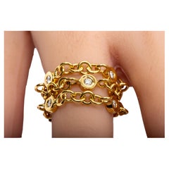 Anello moderno con diamante a catena in oro giallo 18k
