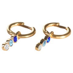Modern 18k yellow gold earrings with blue sapphire, aquamarine and diamond