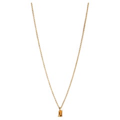 Modern 18k yellow gold necklace with a emerald-cut citrine