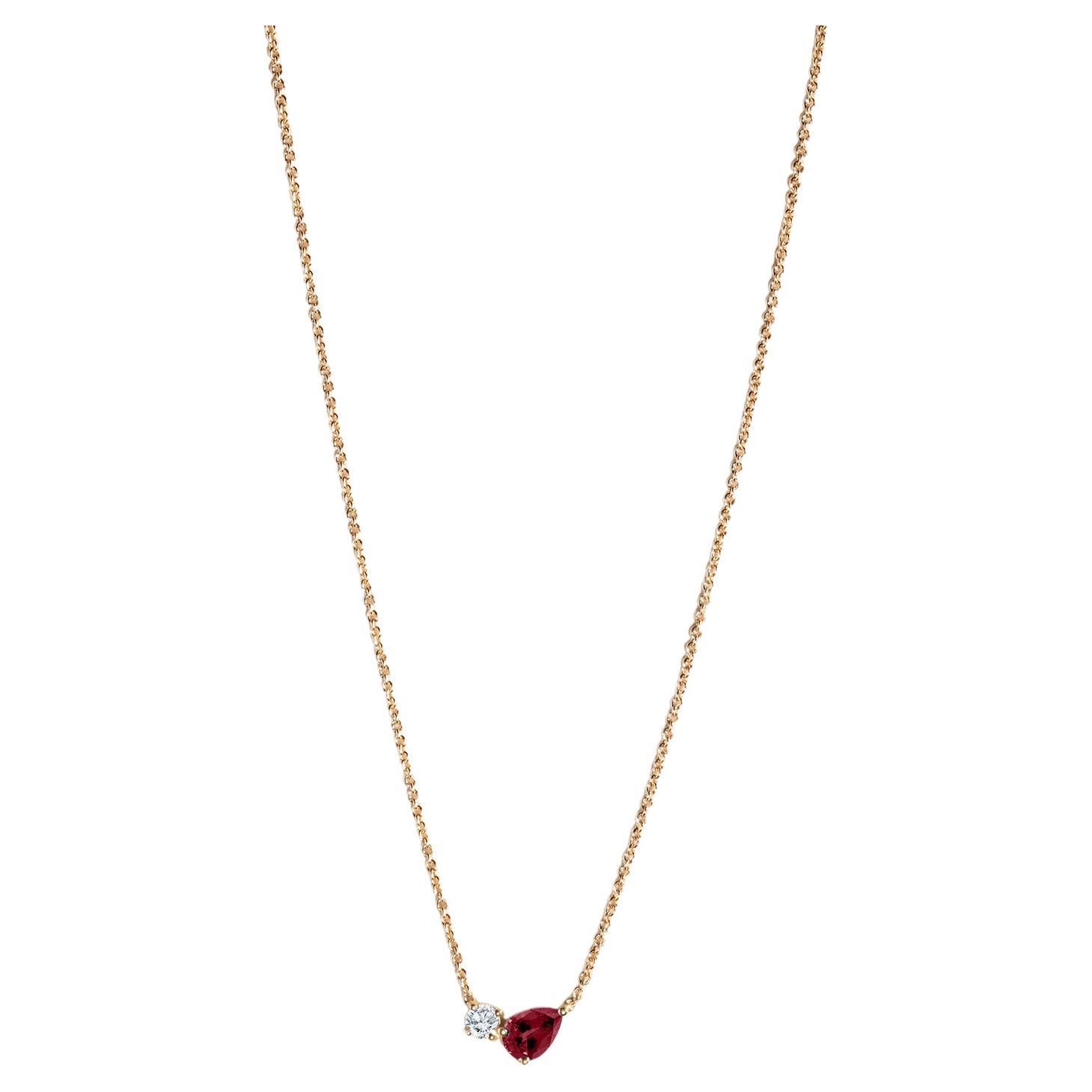 Moderne Halskette aus 18 Karat Gelbgold mit einem Birnenschliff-Turmalin und rundem Diamanten im Angebot