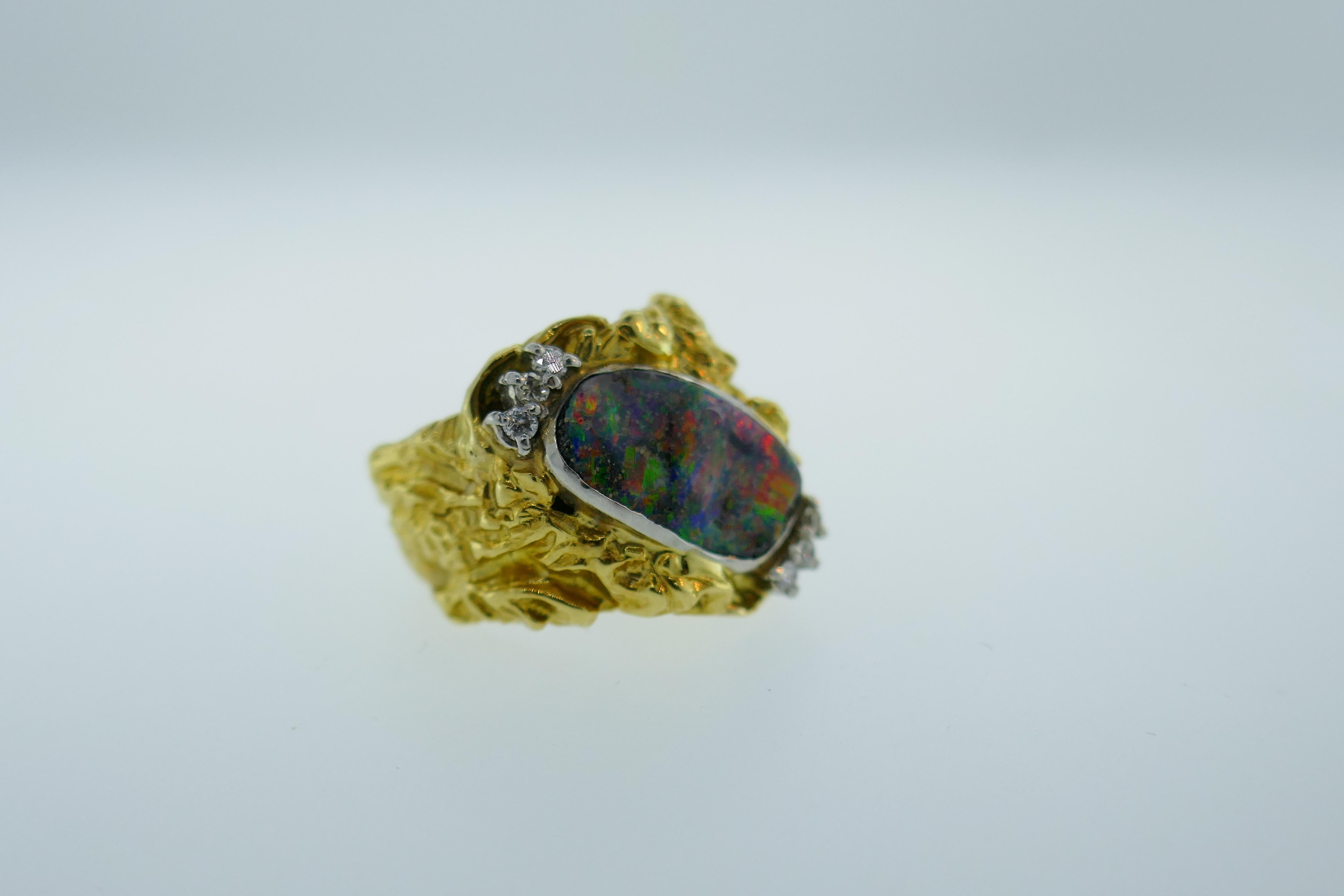Modern 18k Yellow Gold, Platinum, Diamond & Boulder Opal Ring Circa 1990s





Here is your chance to purchase a beautiful and highly collectible modern ring.  Truly a great piece at a great price! 



Weight: 11.8 grams



Condition: