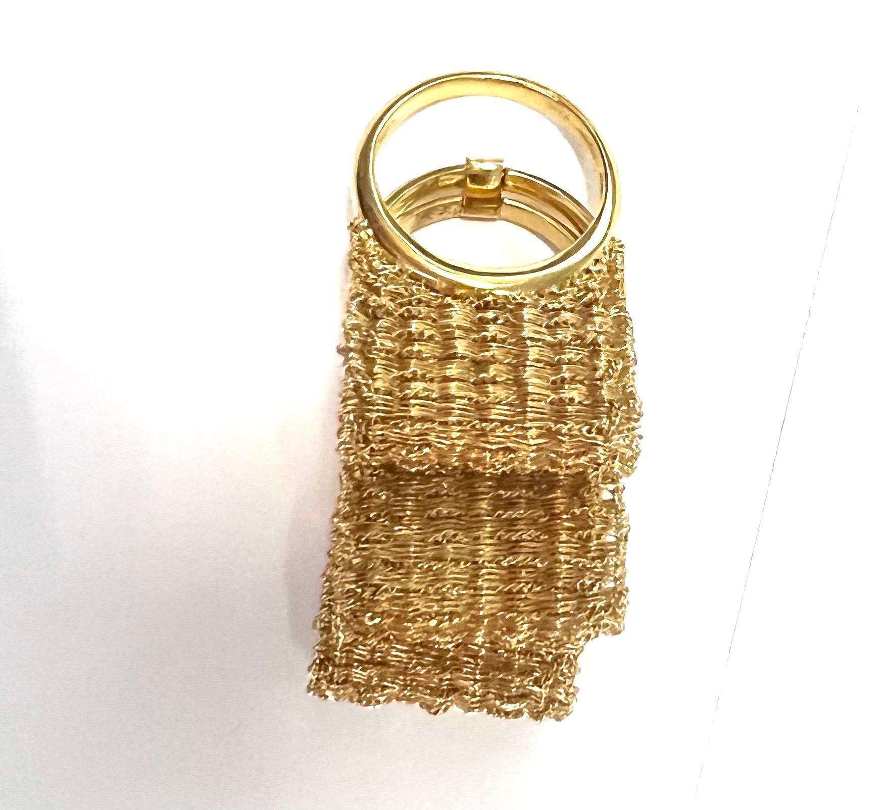II Finalist at the Oscar Jewelry competition
This ring was especially made for the competition.
Ring with gold fabric details.
Gold weight gr 28.80
Size 6 1/2
Stamp MICHELETTO 750 10 MI  ITALY

This ring can make set with 4768-G (Necklace) and