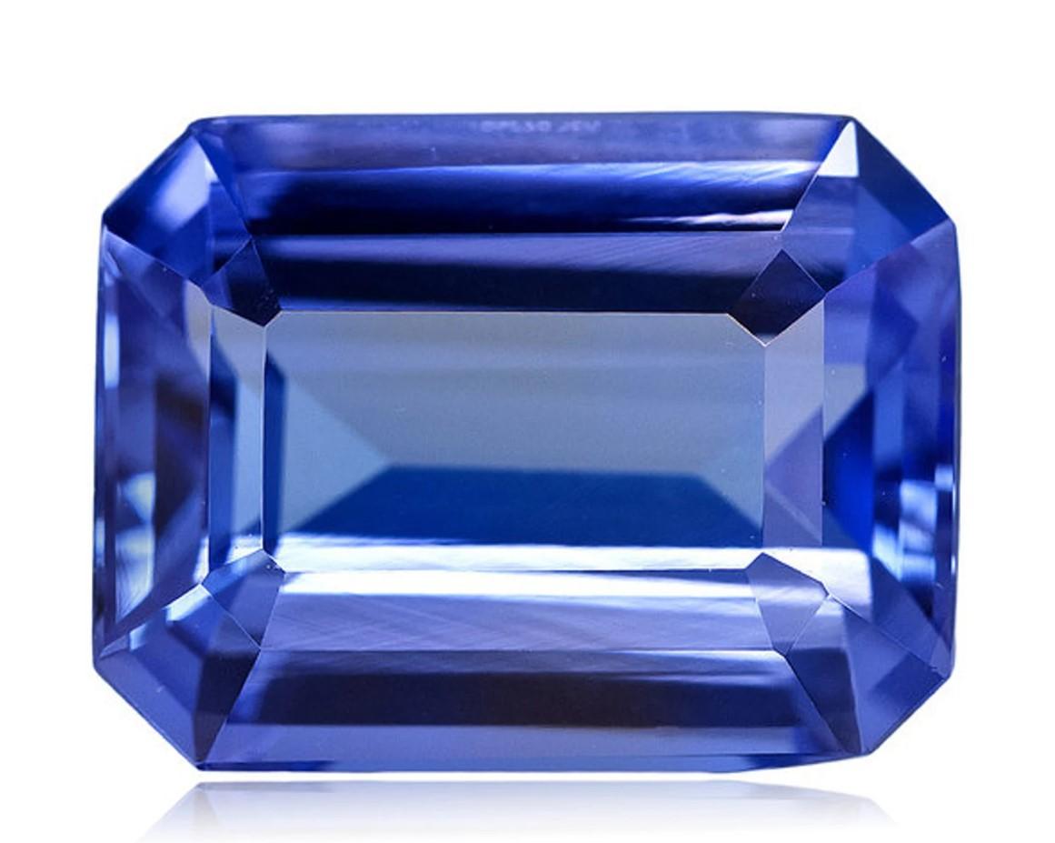 En vente :  Bague moderne en or jaune 18 carats avec une tanzanite taille émeraude et un diamant taille poire 2