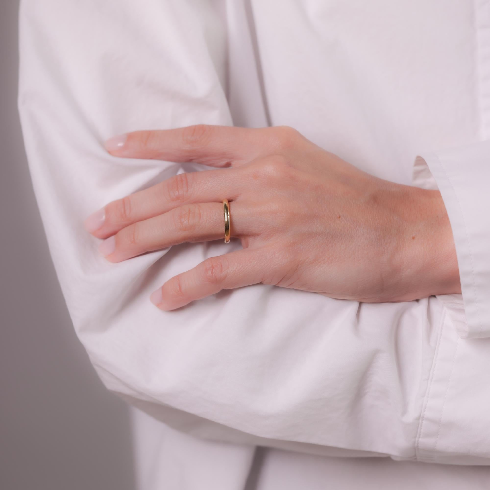 This modern 18k yellow gold ring, crafted in the 2020s, is hallmarked with a purity mark and has a total gram weight of 3.61.

Metal: 18k yellow gold 
Era: Modern
Circa: 2020's
Hallmarks: Purity mark
Size: 5 and can be resized
Gram weight: 3.61