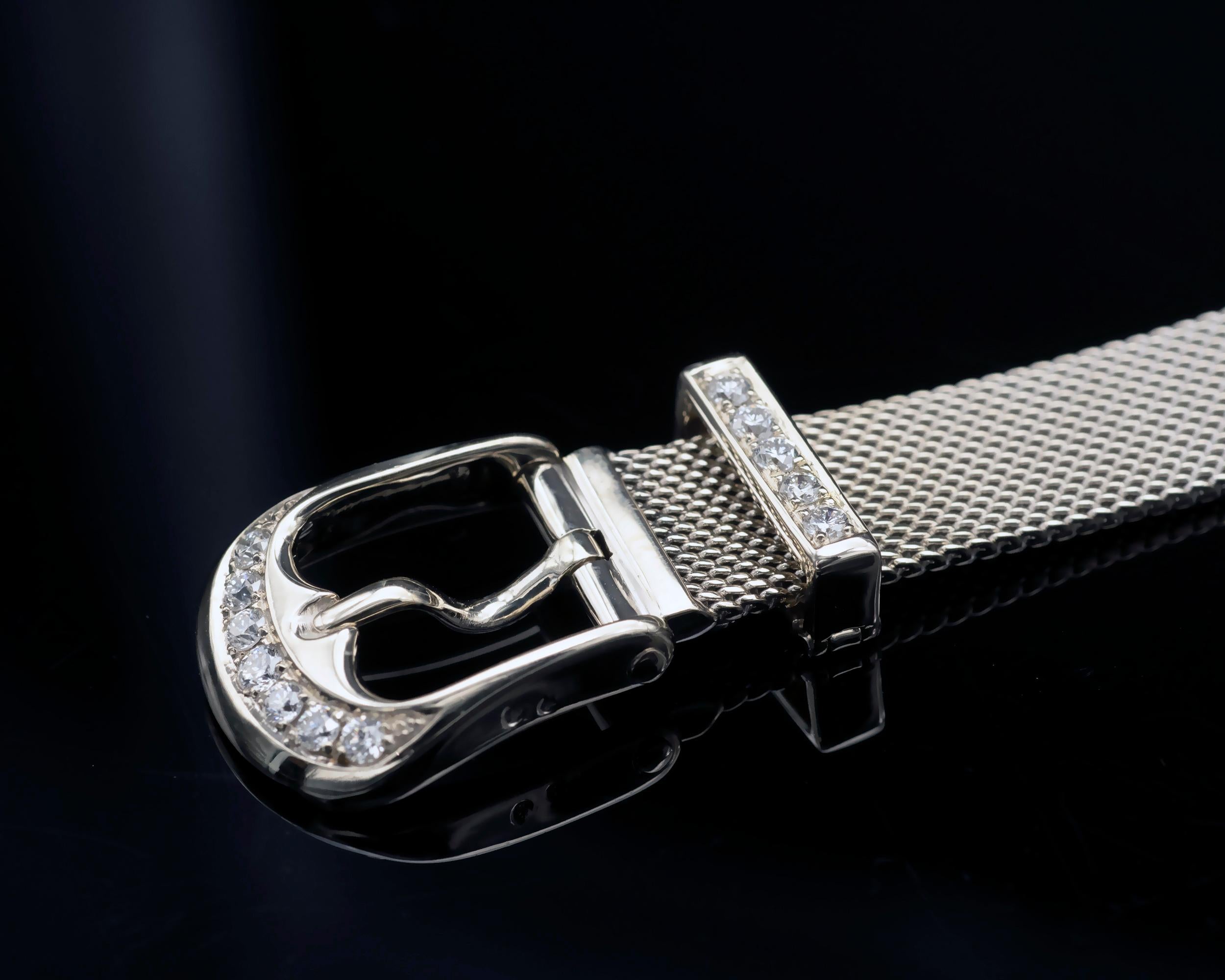 Introducing this exquisite and trendy 18 karat white gold belt buckle bracelet. The flexible design gracefully wraps around your wrist. At its end the 