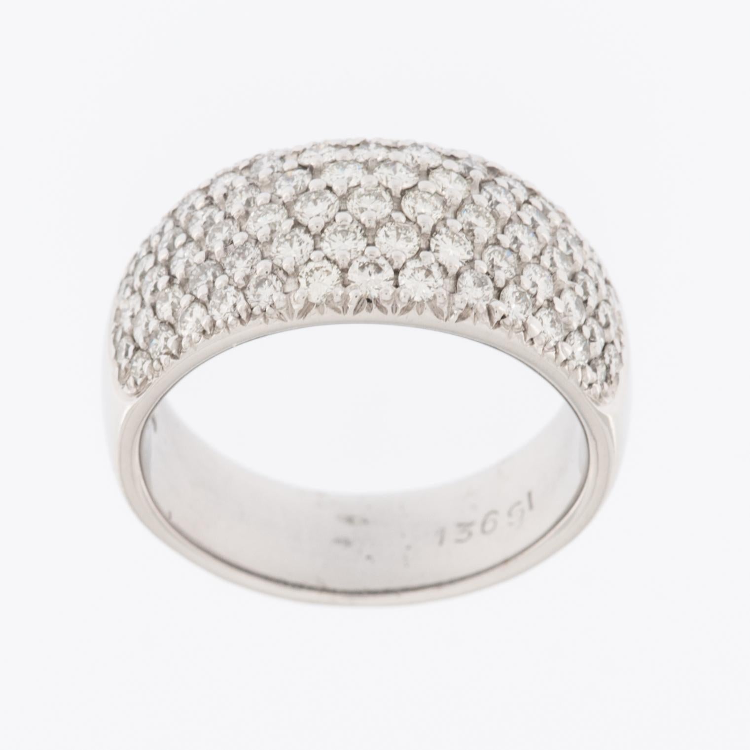 This modern 18kt white gold ring band is a stunning and elegant piece of jewelry. The use of 18-karat white gold gives the ring a luxurious and contemporary feel, while the white gold metal adds a touch of sophistication.

The ring features a design