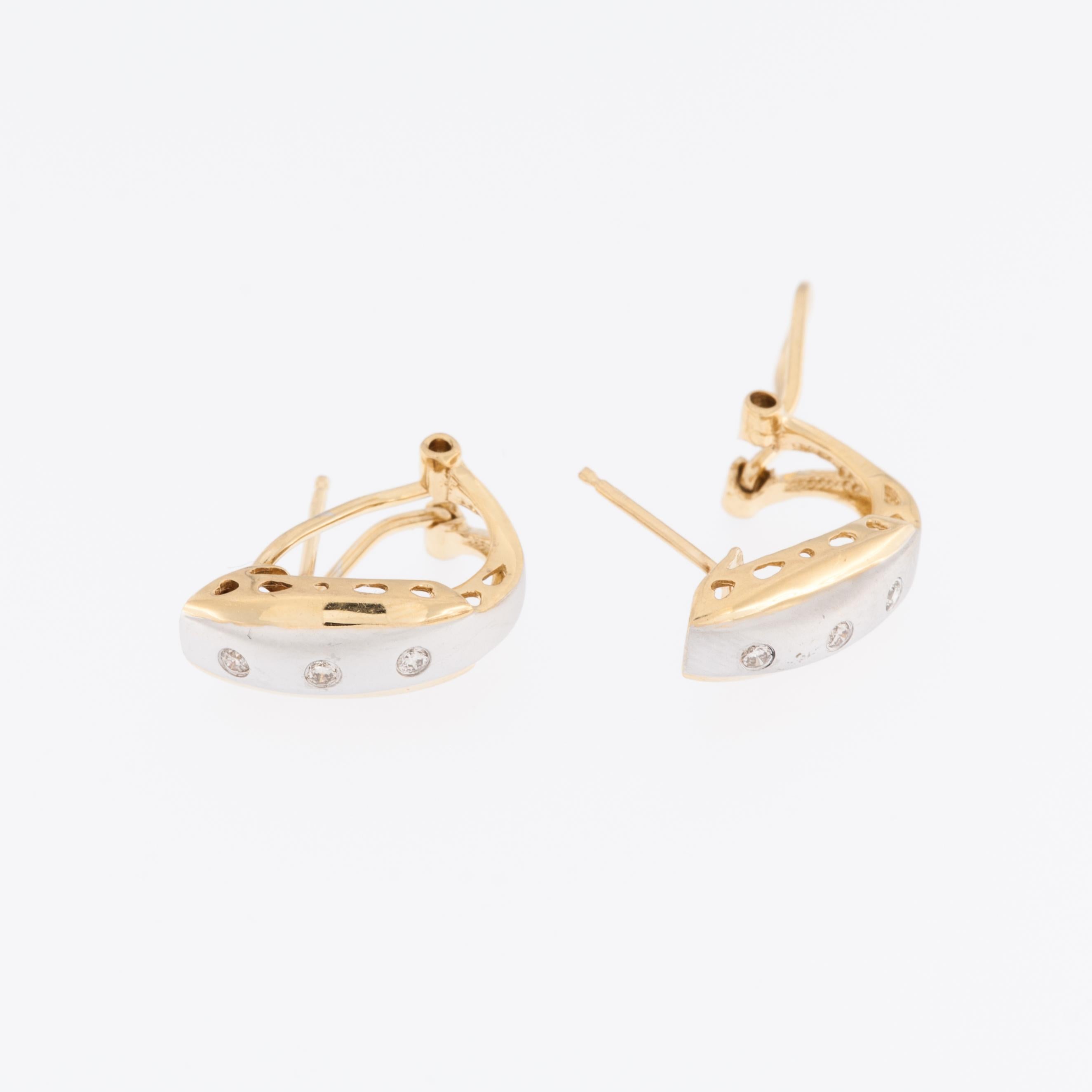 The Modern 18kt Yellow and White Gold Earrings are a sophisticated and elegant piece of jewelry. The meticulous craftsmanship is evident in every detail, making these earrings a true work of art.

The design showcases a seamless fusion of two