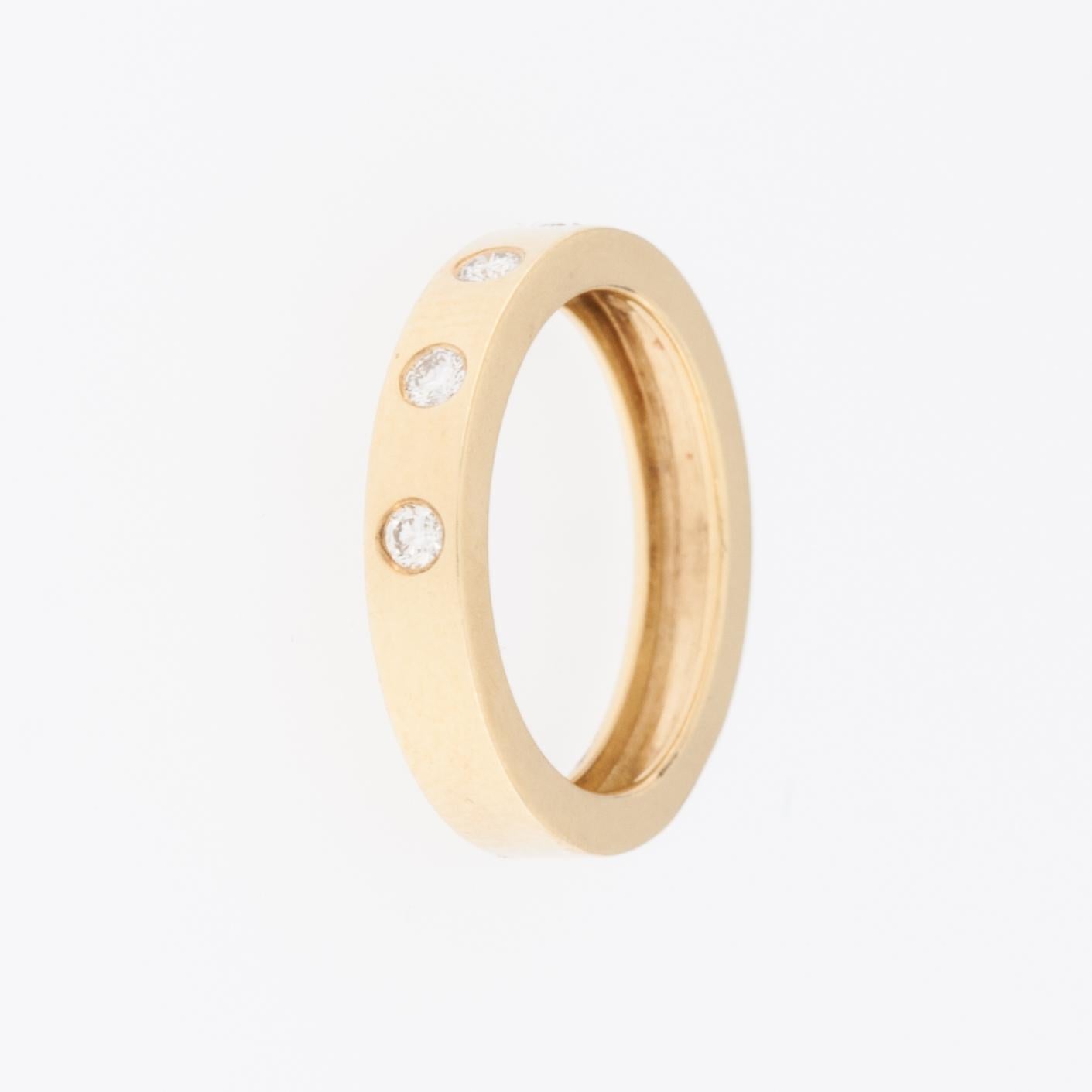 Brilliant Cut Modern 18 karat Yellow Gold Band Ring with Diamonds For Sale