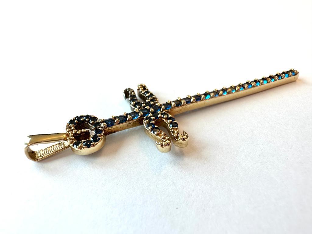 Modern 18kt Yellow Gold Spanish Cross with Blue Zircons and Crescents Endings  In Good Condition For Sale In Esch sur Alzette, Esch-sur-Alzette