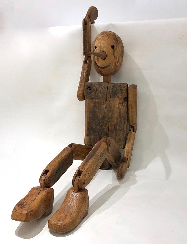 wooden pinocchio statue
