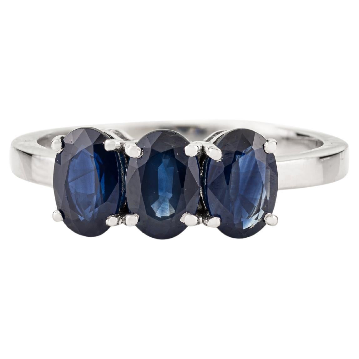Modern 2 Carat Oval Cut Deep Blue Sapphire Three Stone Ring in 14K White Gold