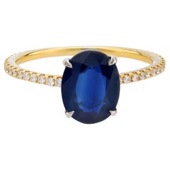 Modern 2 carat oval cut sapphire diamond 18k yellow gold ring