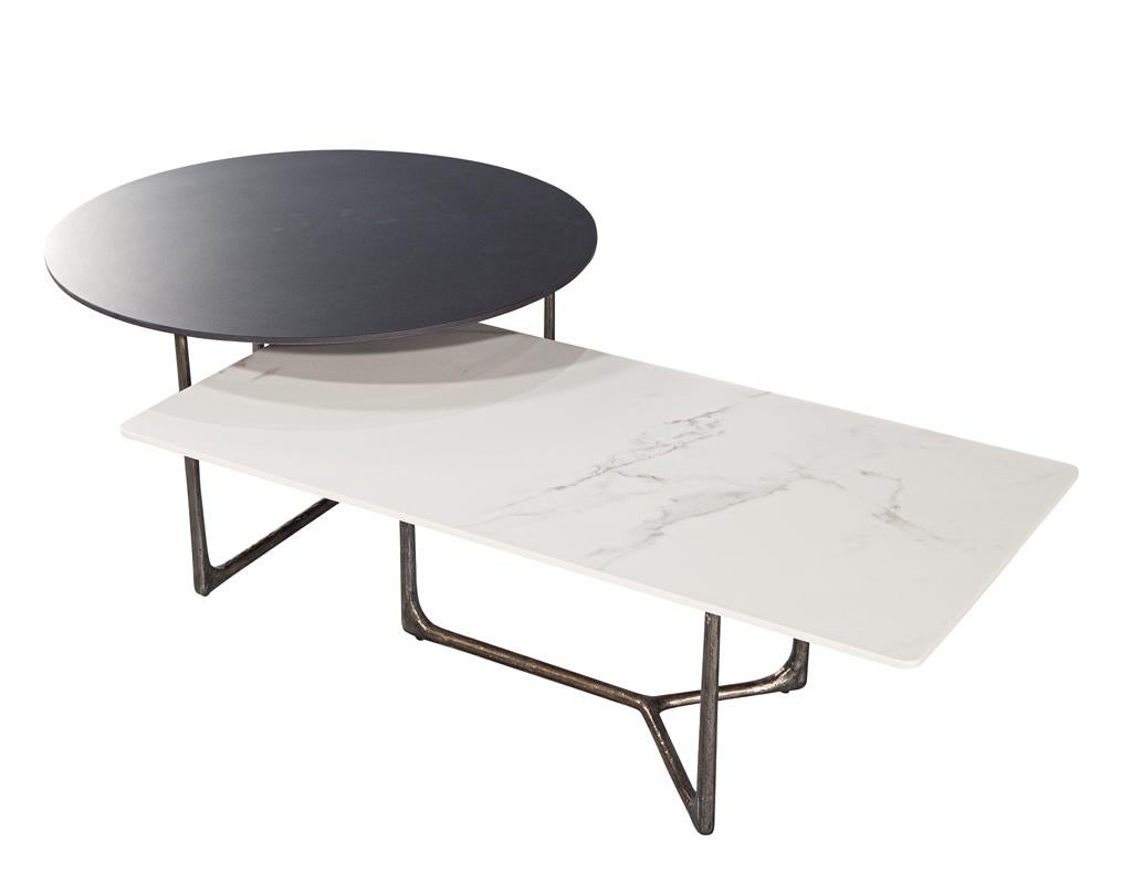 This set is the epitome of sophistication and style, with its unique hammered metal bases and porcelain tops. Each table features a different color and shape, making it a truly one of a kind creation. The first table boasts a round honed matte