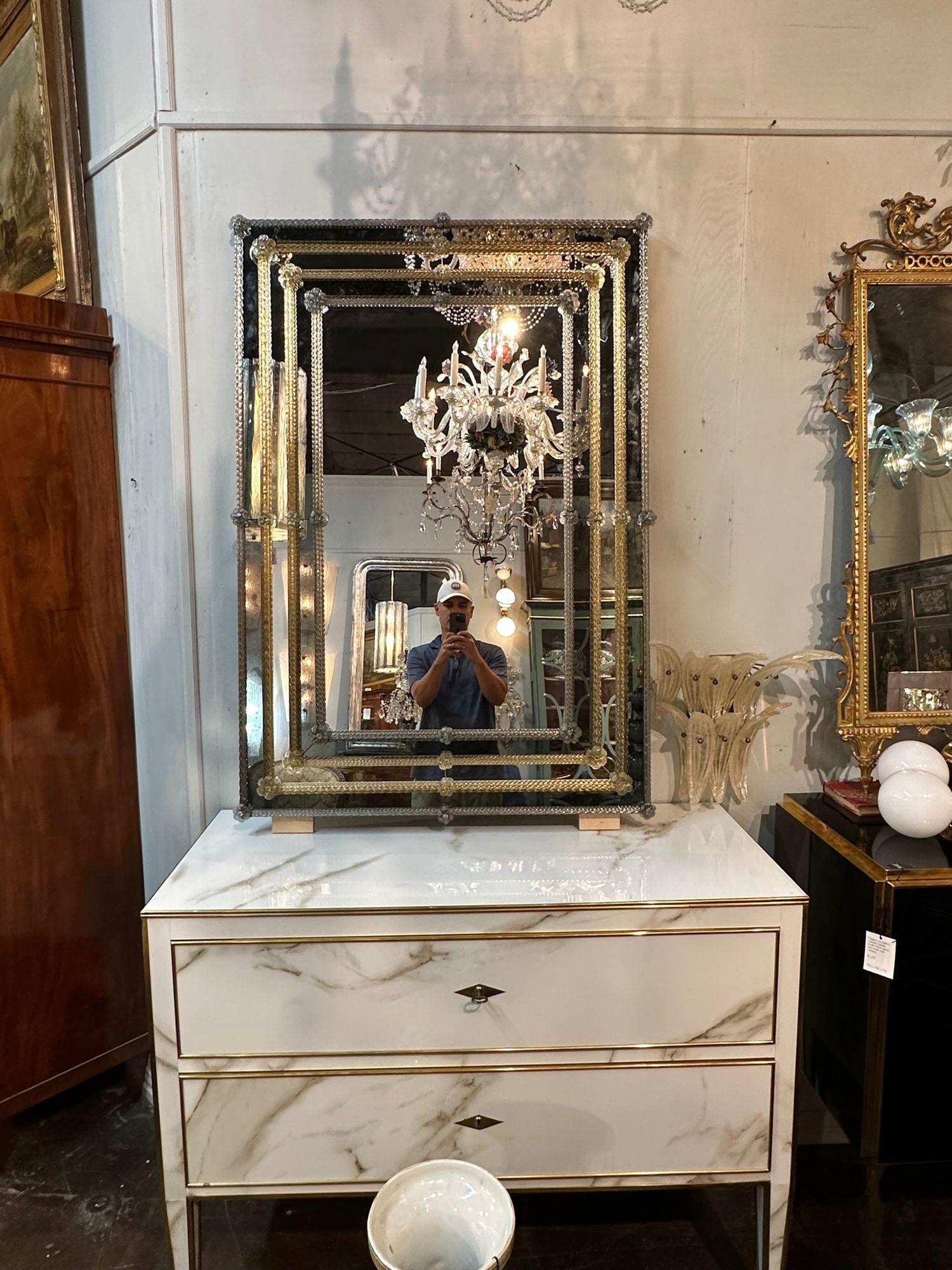 Fabulous modern 2 tone Murano glass mirrors. Beautiful silver colored and gold colored textured glass with flowers on the corners. True works of art! Exquisite!