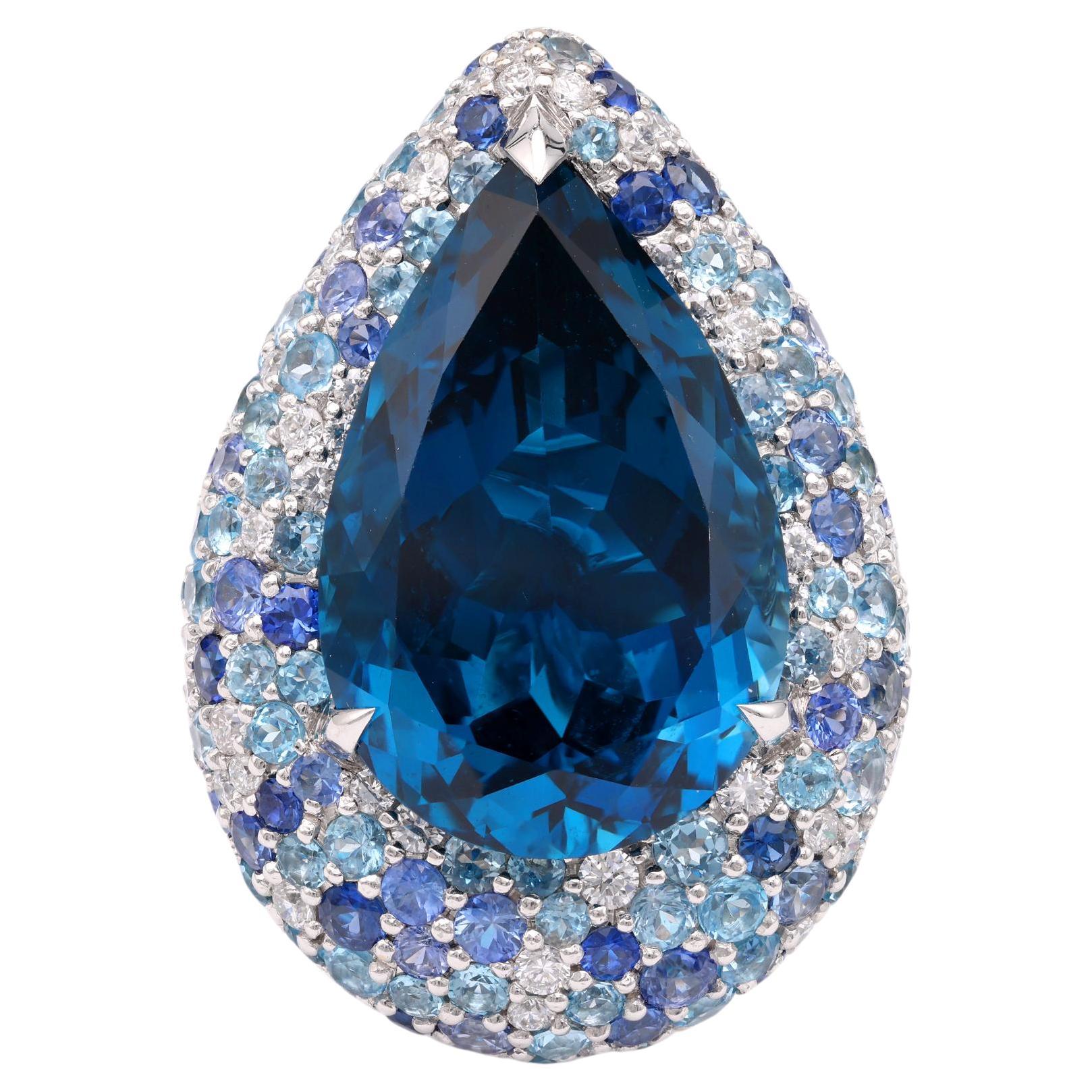 Modern 20 Carat Blue Topaz Diamond Sapphire White Gold Cocktail Ring For Sale