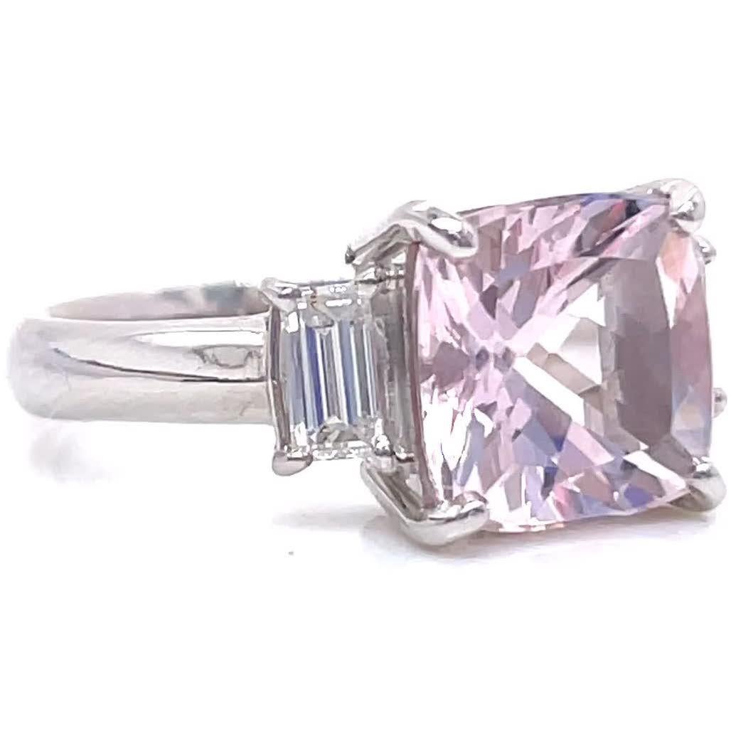 If you like pastel shades, this ring would be great for you. It's a modern 2.06 carat Morganite diamond platinum ring. The pastel pink color of this morganite reminds you of a strawberry soufflé or a glass of a bubbly rosé. Cheers to you and