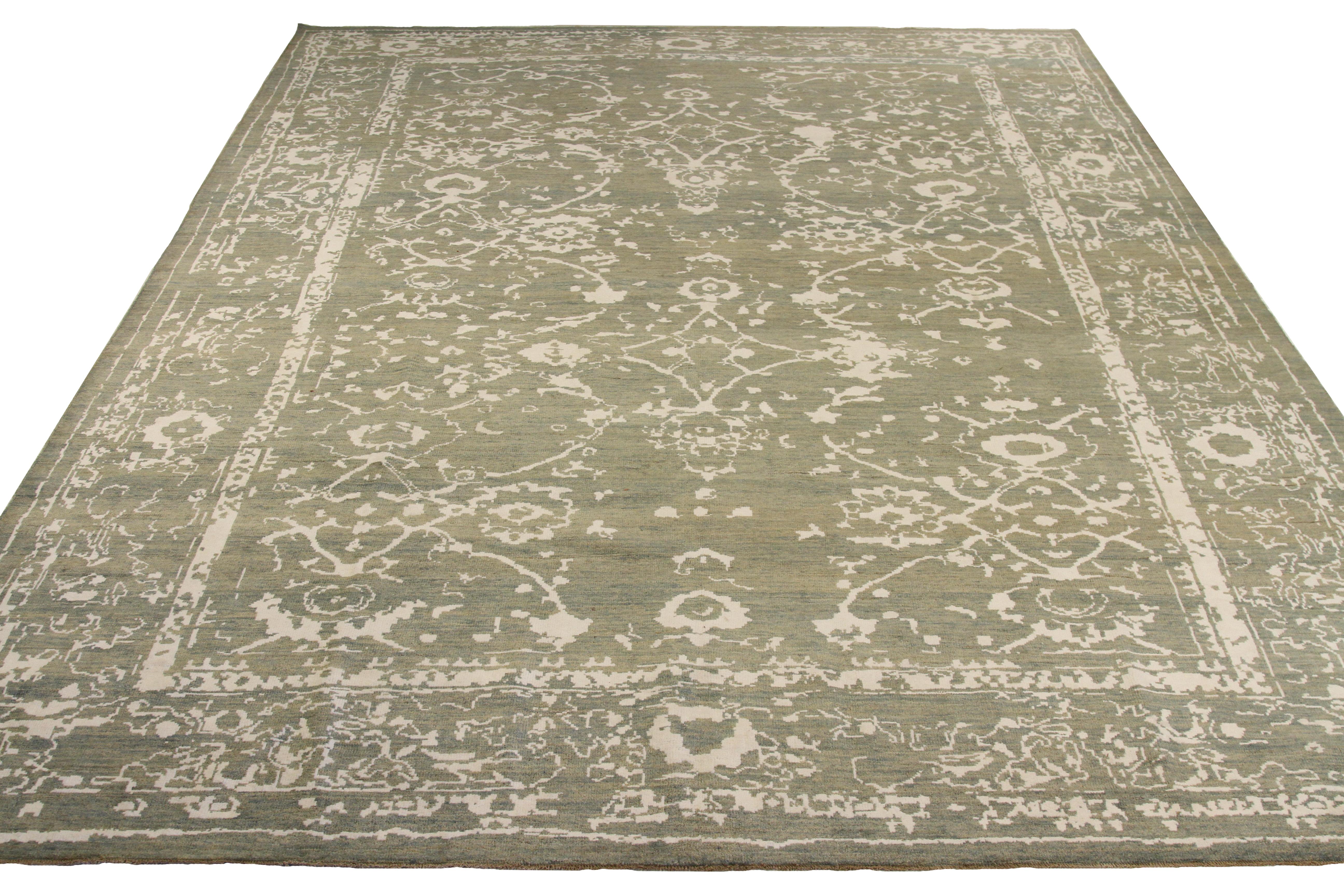 Modern hand-woven Persian area rug made from fine wool and all-natural vegetable dyes that are safe for people and pets. This beautiful piece features a rich field of floral details in various colors which is the traditional weaving design of