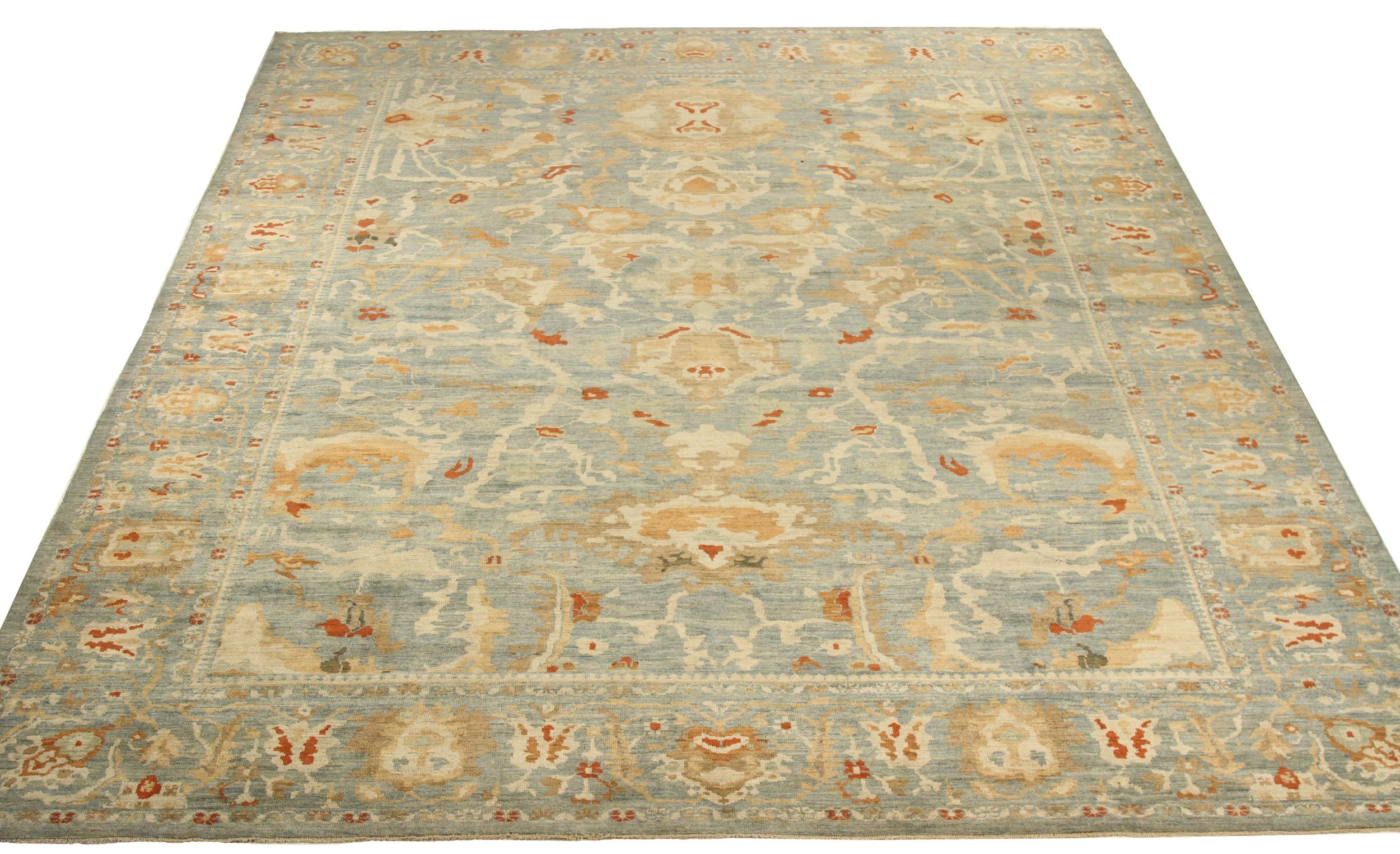 Modern hand-woven Persian area rug made from fine wool and all-natural vegetable dyes that are safe for people and pets. This beautiful piece features a rich field of floral details in various colors which is the traditional weaving design of
