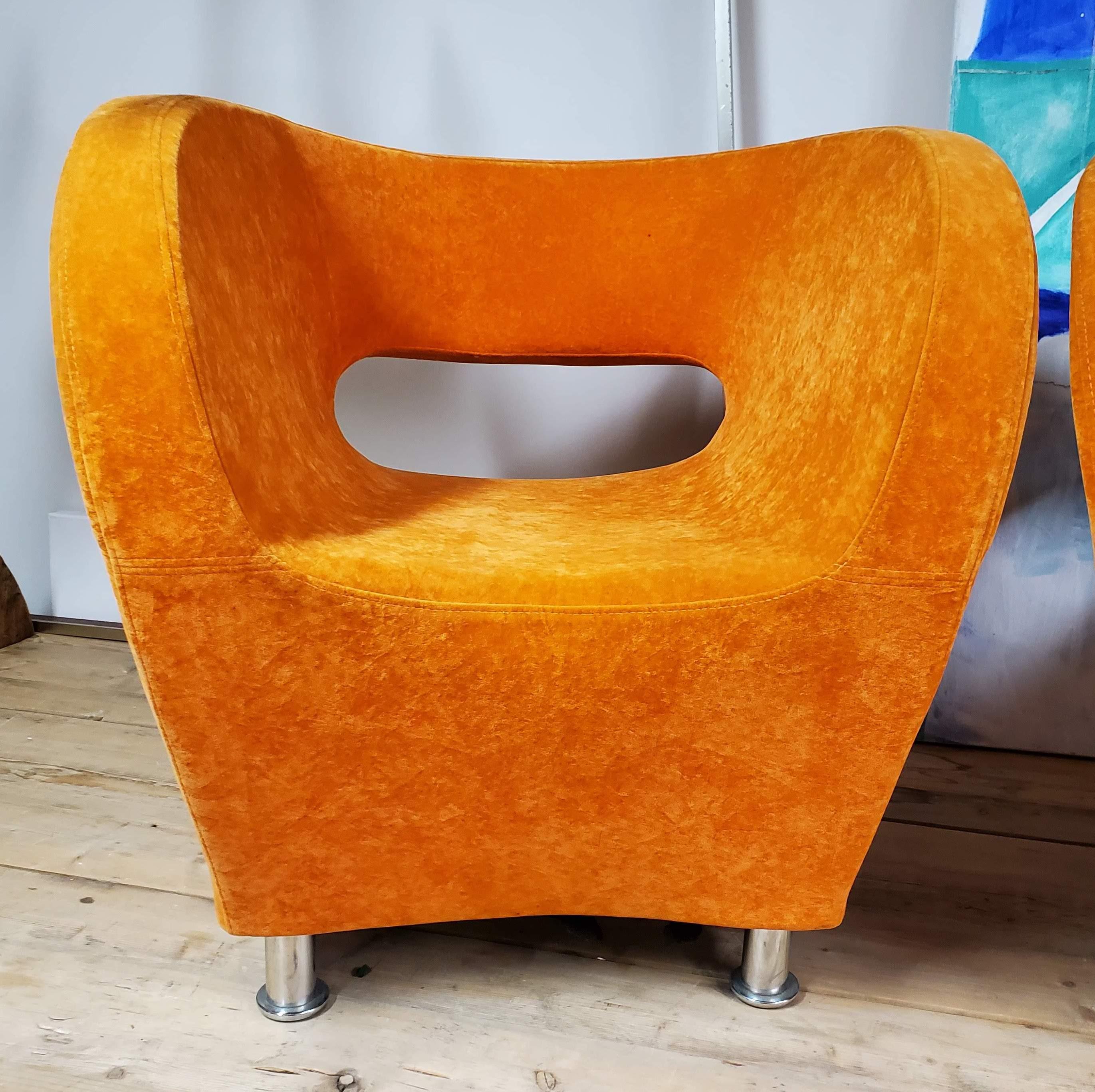 Unknown Pair of Orange Barrel Tube Salazar Lounge Club Chairs