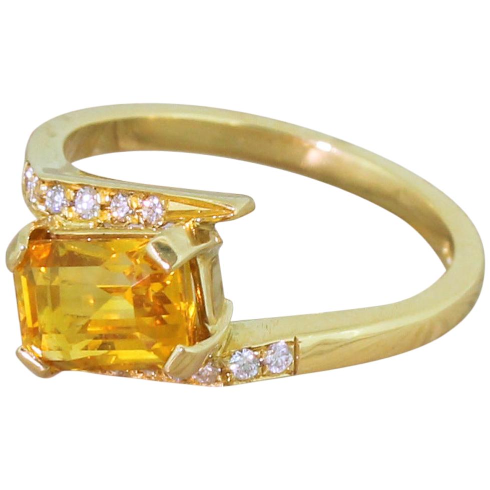 Modern 2.36 Carat Emerald Cut Orange Sapphire Solitaire Ring For Sale