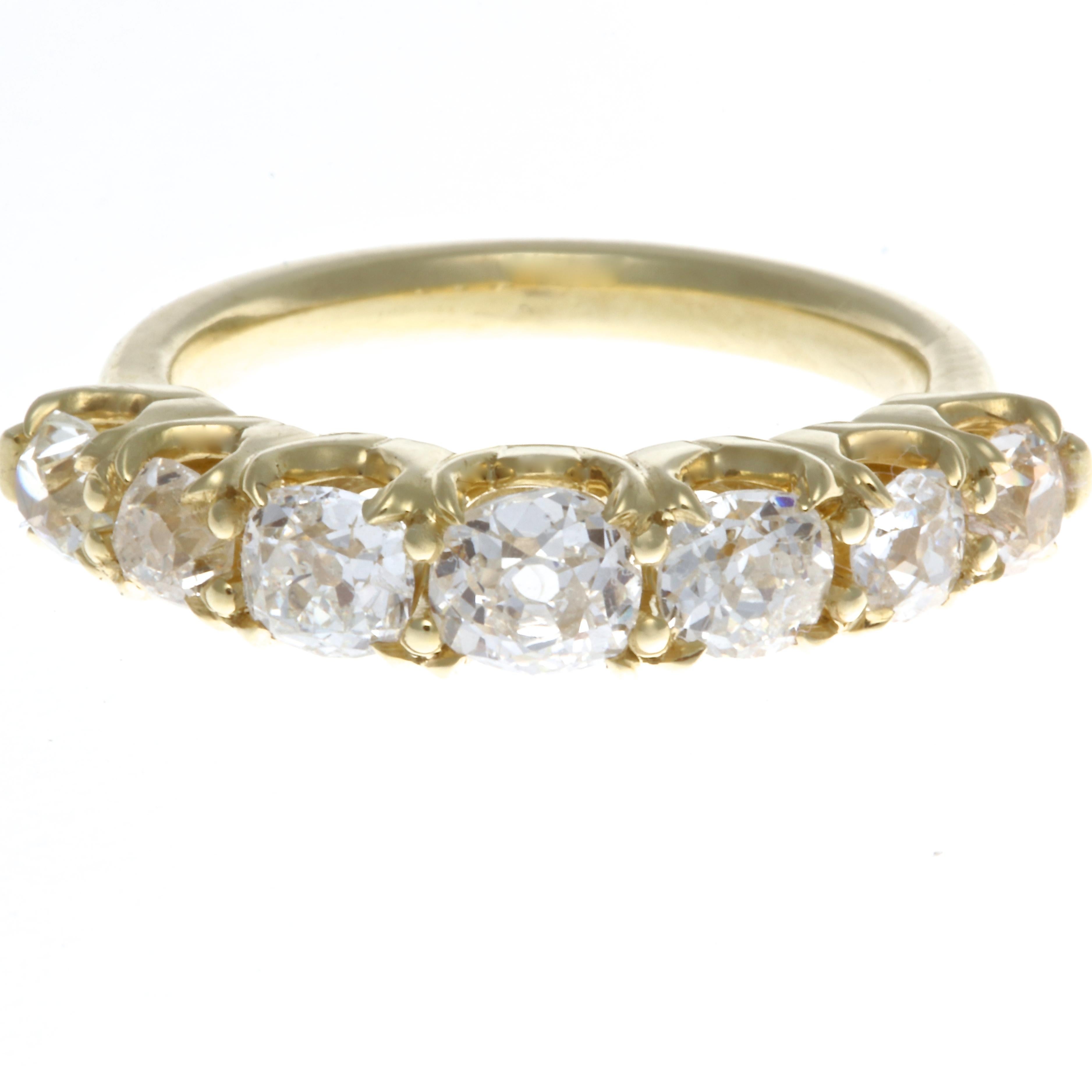 Where Modern meets Victorian. An original creation featuring a striking combination of 18k yellow gold and 7 white diamonds. This ring will be a great addition to your collection and is a timeless piece that can be worn solo any time or stacked with