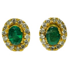 Modern 2.50 Carat Emerald & Diamond Studs For Ladies.