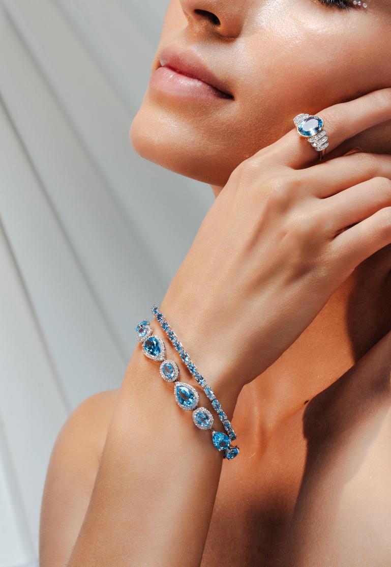 This 25.92ct Mixed Cut Blue Topaz and Diamond Tennis Bracelet in 18K gold showcases 25.92 carats endlessly sparkling natural blue topaz and 1.24 carats of diamonds. It measures 7 inches long in length. 
Blue topaz promotes truth and forgiveness,