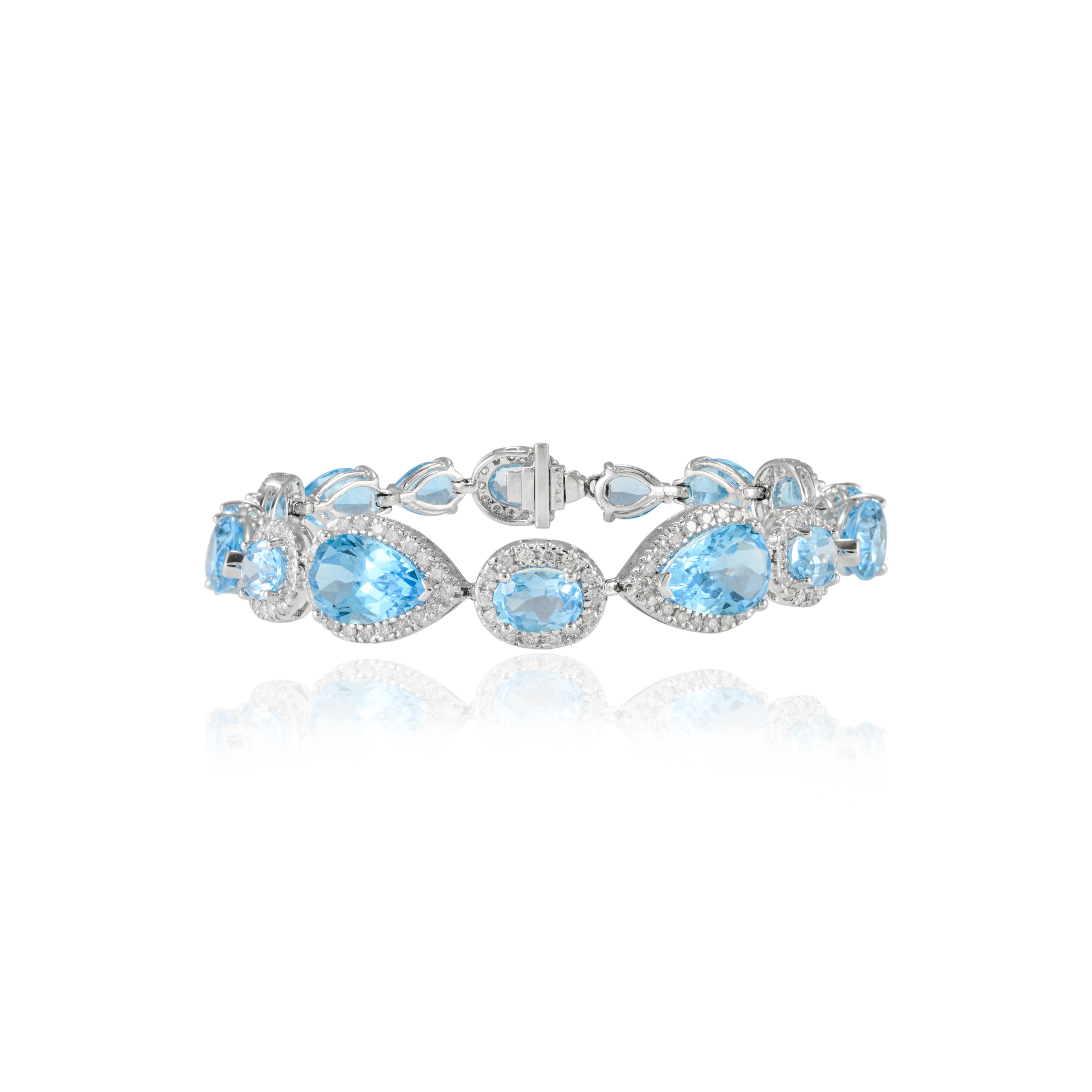 Moderne 25.92ct Topaze bleue et diamant Halo Bracelet de tennis en or blanc 18k en vente