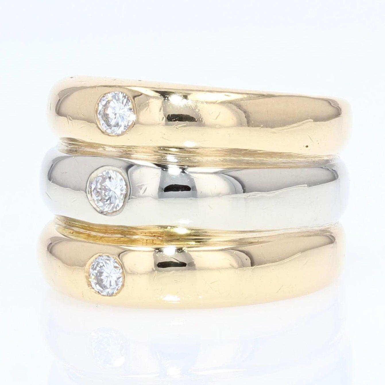 Bracelet jonc moderne en or jaune et blanc 18 carats avec 3 diamants en vente 3