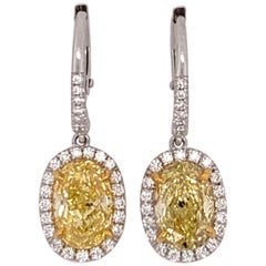 Boucles d'oreilles modernes en platine avec diamant jaune intense naturel certifié GIA de 3,09 carats